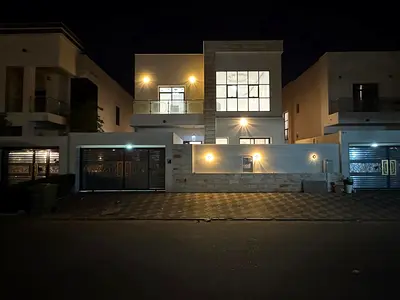 Villa for sale in Al-Yasmeen featuring 5 master bedrooms, a majlis, a living area, a kitchen, and a maid's room; includes water, electricity, and air