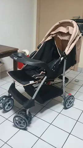 Lightweight beige/black standard baby stroller in good condition