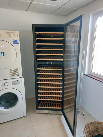 Terim Large freestanding wine cooler / beverage fridge - multiple shelves, glass door