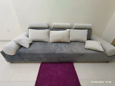 3-seater grey sofa with cushions