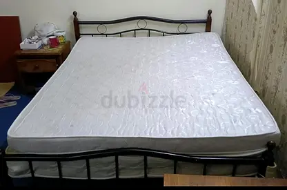 Queen metal bed frame with mattress - good condition