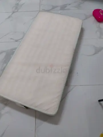 Used baby crib mattress - firm, clean condition