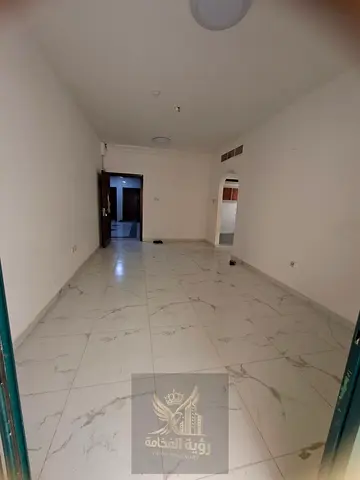 For rent in Al Qulaiyah Sharjah one bedroom and living room with balcony central AC and central gas annual rent AED 28000 deposit 5 percent deferred w