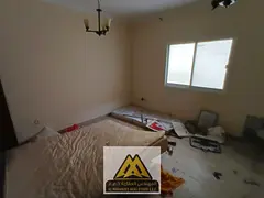 Annual Rent – 2BR & Living | Al Hamidiya 1, Ajman. Master bedroom, central AC, built-in wardrobes,