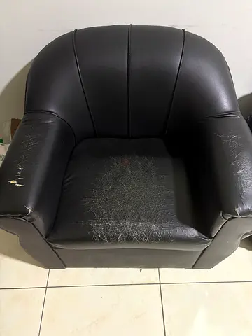 Free Black leather armchair with minor wear and tear