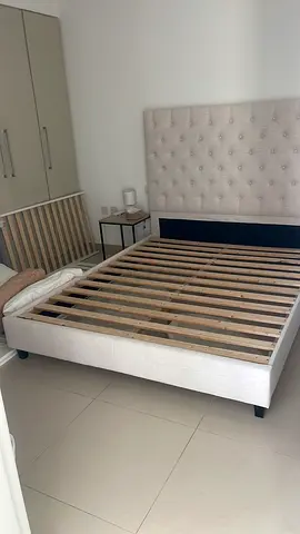 Queen bed frame with upholstered headboard - light beige as new