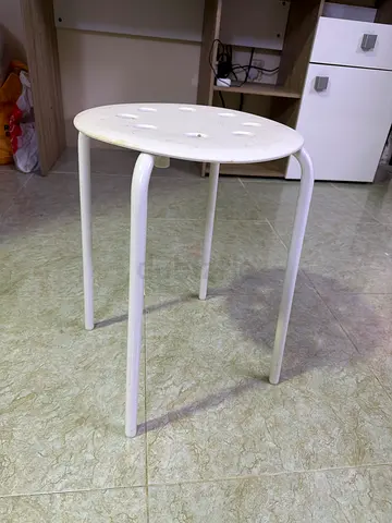 Simple white round metal stool - lightweight and sturdy