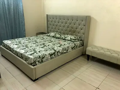 King size upholstered bed with mattress and bedside unit - good condition