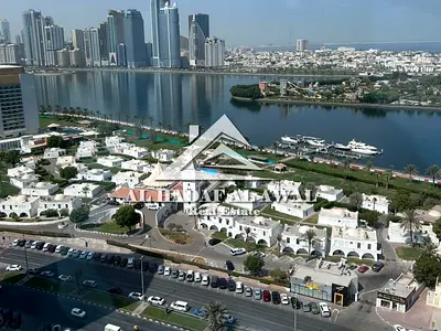 For sale: Apartment with two bedrooms, a living room, and three bathrooms in Al Majaz 1.