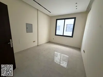 For annual rent in Ajman: excellent 2-bedroom apartment with a living room—first-time occupancy.