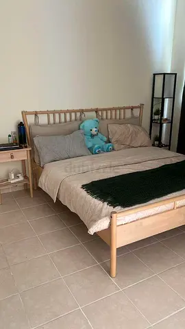 IKEA Modern Light Wood Double Bed Frame and Mattress, along with attached Cushions
