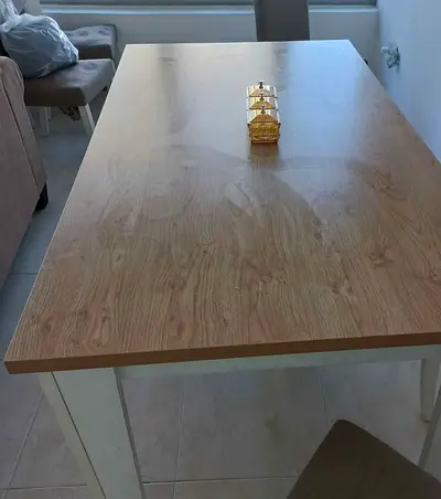 Solid wood top dining table with white legs - good condition