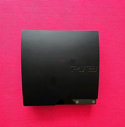 Sony PlayStation 3 Slim - Good Working Condition with over 20 games