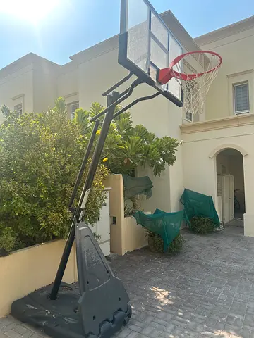 Portable adjustable basketball hoop with base - used, good condition