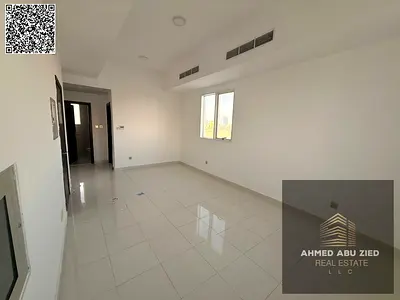 1BR hall in Liwara near Ajman Corniche and Sharjah exit; central AC, second tenant, close to services; yearly rent AED 29,000