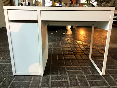 White compact study desk with storage drawer and cabinet