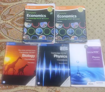 Cambridge IGCSE Textbooks Economics Biology and Physics Multiple Textbooks Different Versions :)