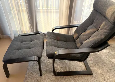 POÄNG
Armchair, walnut effect/Gunnared dark grey with footstool.