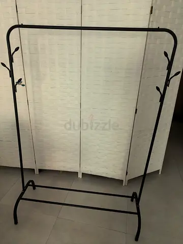 Metal freestanding clothes rack with hooks - black