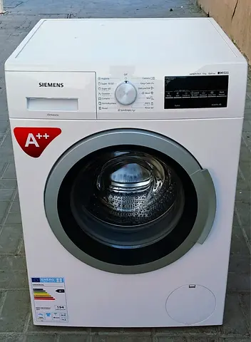 Siemens brand 9kg washing machine white color condition is working properly.