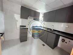 New barnd 2bhk with parking 1 month free 2 balcony open view tilal city Sharjah