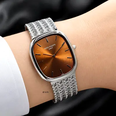 Patek Philippe Geneve Vintage Steel Watch with Brown Sunburst Dial