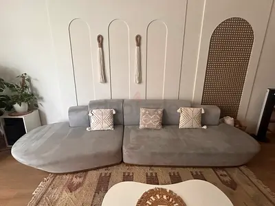 Low-profile modern grey fabric sofa (4-seater modular lounge)