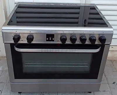 Hoover electric cooker 90x60cm with 5 hobs and oven, condition good working.