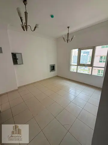 For rent: one-bedroom apartment with a living room in Al Majaz 1