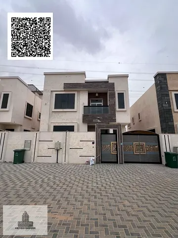 Villa for rent in Ajman, Al yasamin area. Ground floor, first floor, and . 5 master bedrooms with built-in wardrobes, equipped with electricity, w