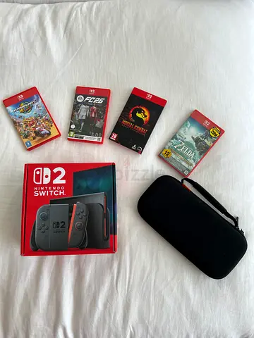 Like New Nintendo Switch 2 Bundle - 4 Top Games (Zelda SEALED, Mario Kart World, FC26, MK) + Bag
