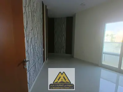 For annual rent in Liwara 1: 2BR, balcony, 2 baths, central AC & gas, new family building, AED 39K,