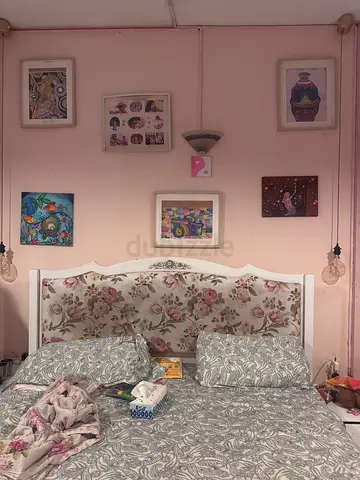 King size bed frame with floral headboard and mattress - good condition with hydraulic storage