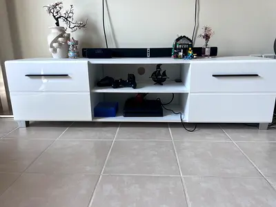 White low TV cabinet with storage drawers — modern design