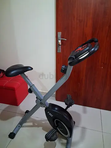 Foldable Upright Exercise Bike with LCD Monitor - Good Condition.