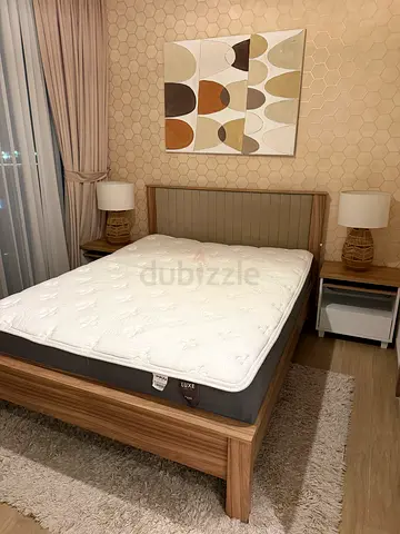 Queen size bed frame with mattress - good condition