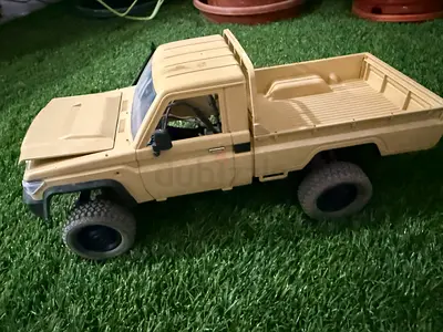 Used beige remote control pickup truck modified motor