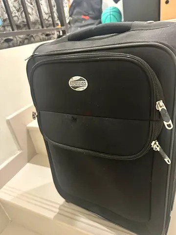 Black soft carry-on suitcase with front pocket - good condition