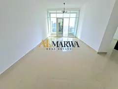 Spacious 1BHK with balcony and built-in wardrobe