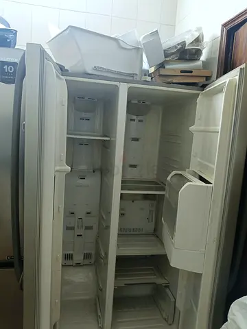 Used side-by-side refrigerator , good condition no issues , Samsung zipel