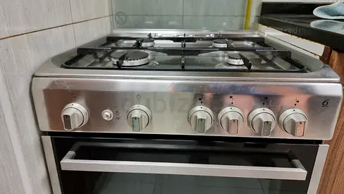 Stainless Steel 4-Burner Gas Stove with Oven - Good Working Condition used little over 3 yrs