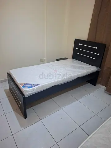 Single bed frame with mattress and headboard - dark wood