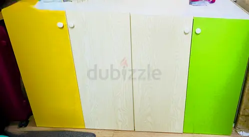 storage cabinet with yellow and green doors - good condition