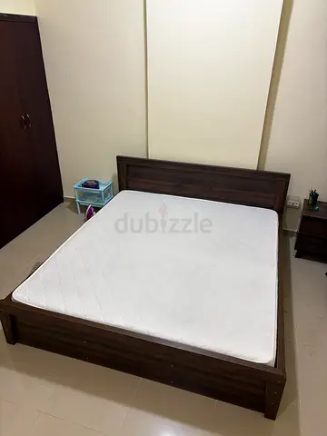 Home box almost new King size wooden bed frame with mattress - dark wood