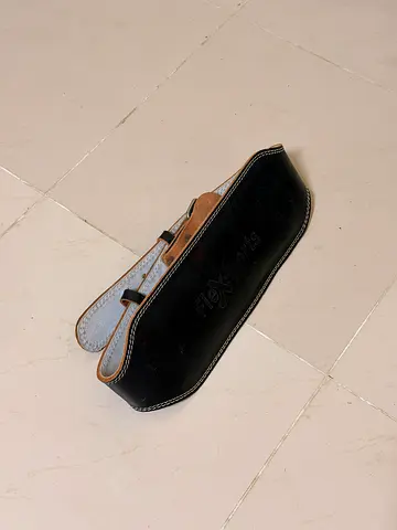 Used black leather lifting belt