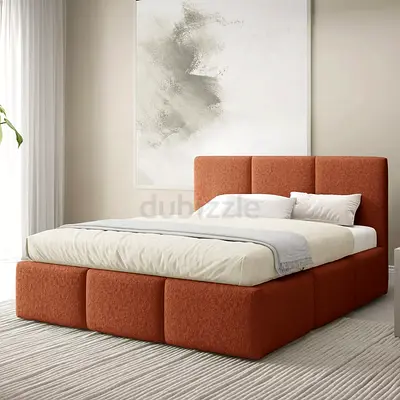 Modern upholstered king-size bed with padded headboard
