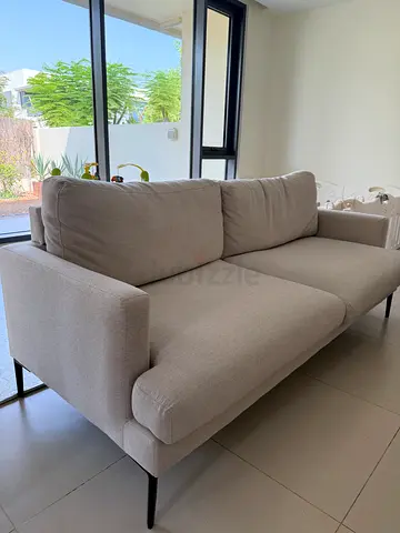 Light beige 3-seater modern sofa in good condition