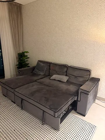 Grey L-shaped sofa with storage