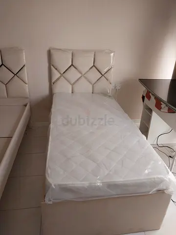 Single bed with mattress and upholstered headboard - good condition