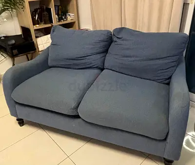 2-seater blue fabric sofa, good condition